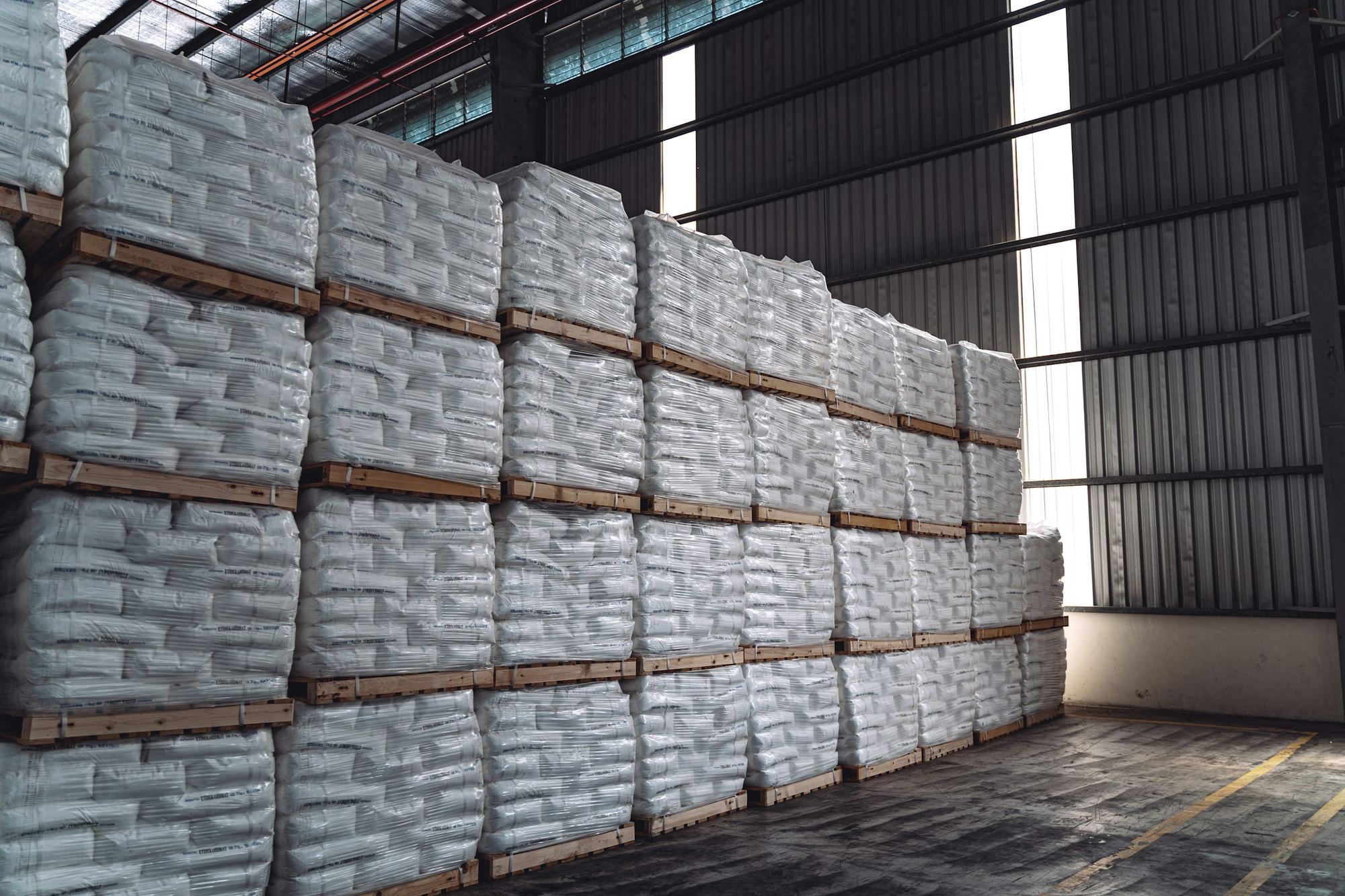 Pallets of packed bags stacked in the warehouse